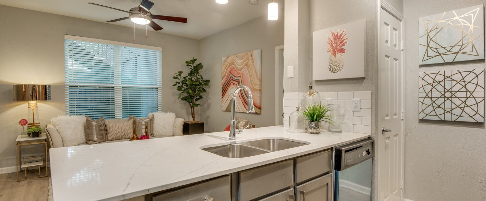 a kitchen with a sink and a refrigerator at The  Sophia